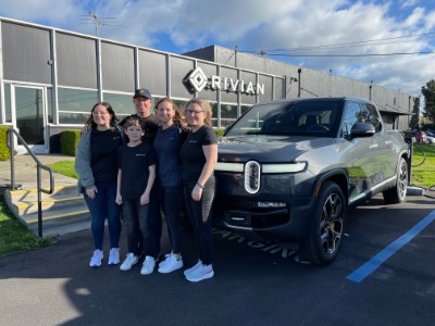 Gates Family in front of Rivian Factory